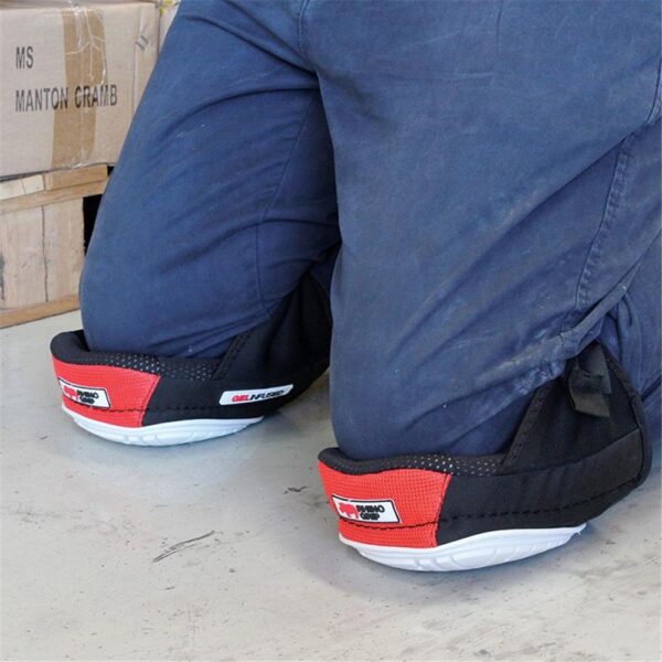 Tradesperson wearing Sterling Gel Knee Pads while installing floor tiles.